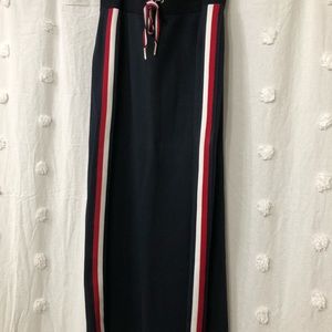 Cute Tommy Hilfiger navy knit skirt. Red white and blue stripe detail.